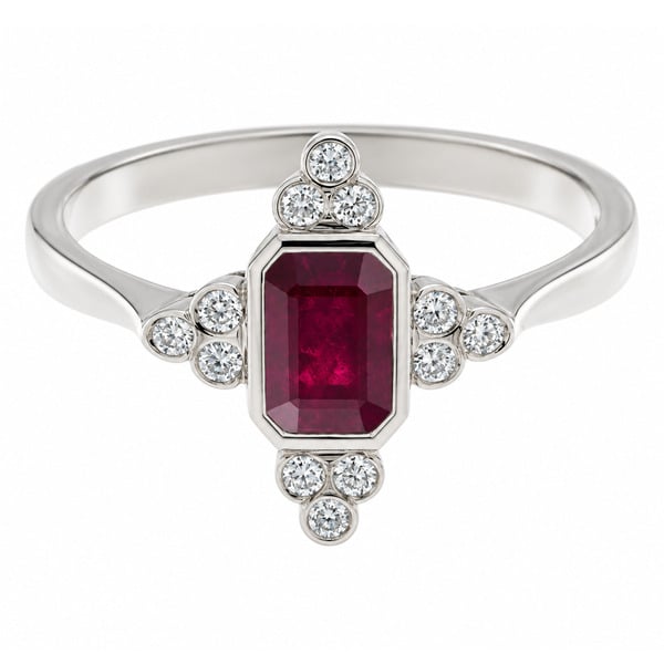 classic art deco cluster style ring with octagon shaped or emerald, step cut ruby centre stone, trilogy clusters of round brilliant cut diamonds top bottom sides platinum gold