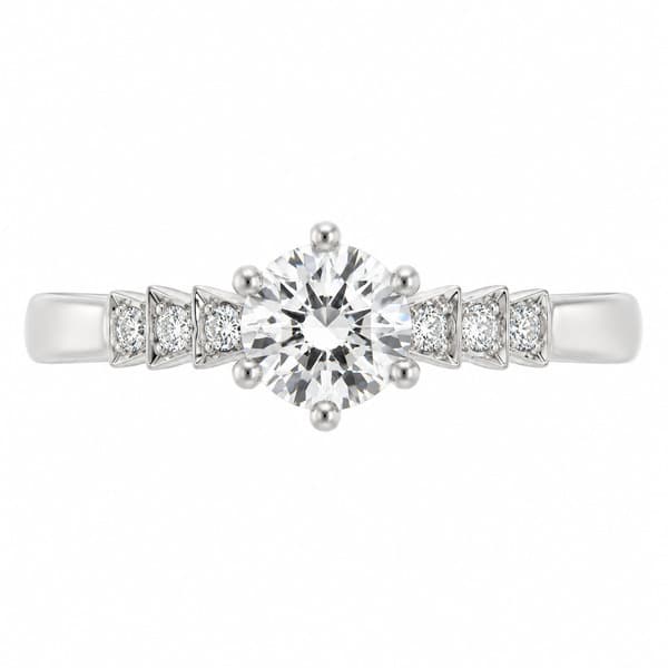 Art deco style round brilliant cut diamond solitaire engagement ring with diamond shoulders design modern platinum gold